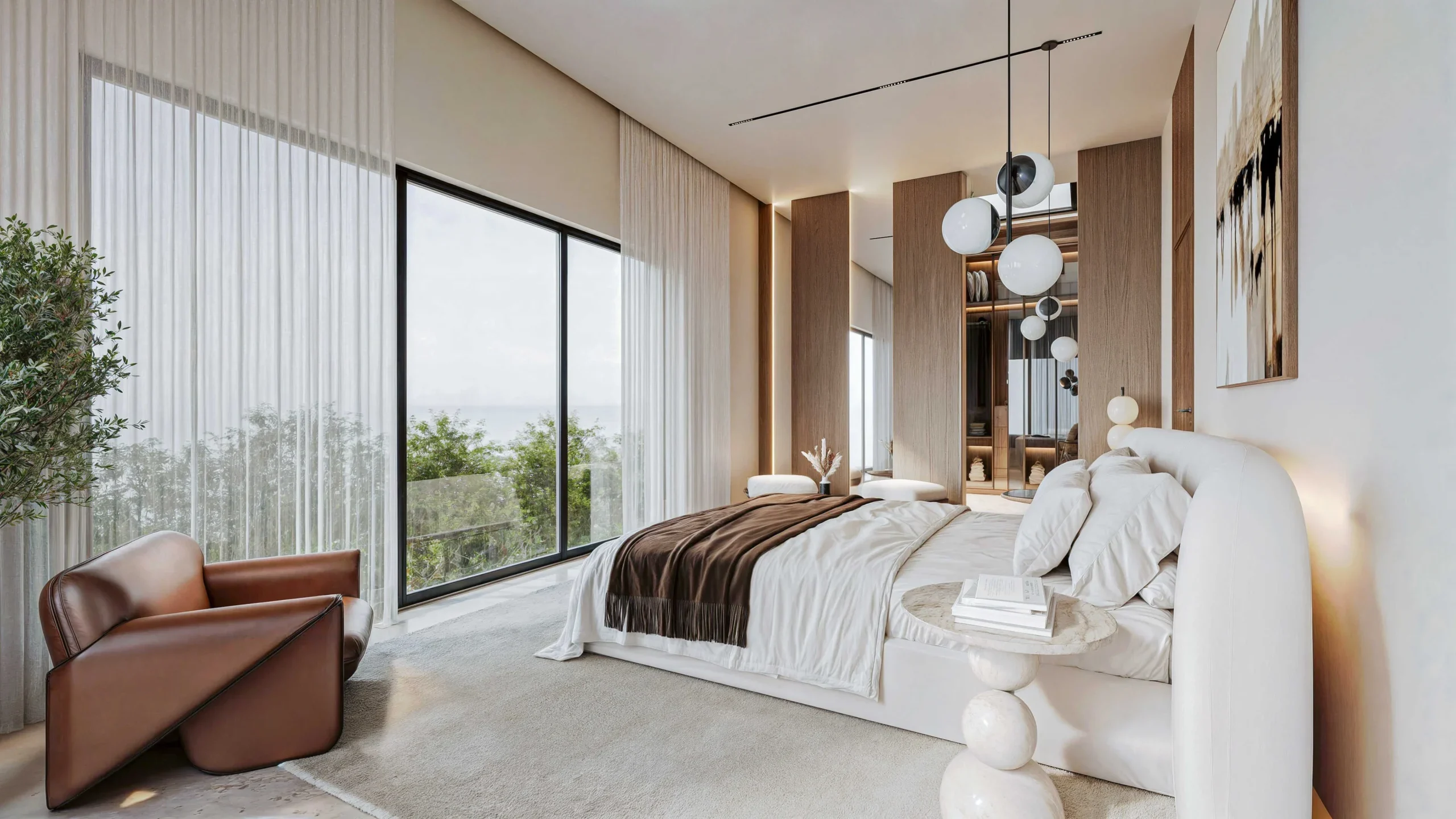 Suite parentale avec grandes baies vitrées et fauteuil design dans une villa moderne réalisée à Marrakech